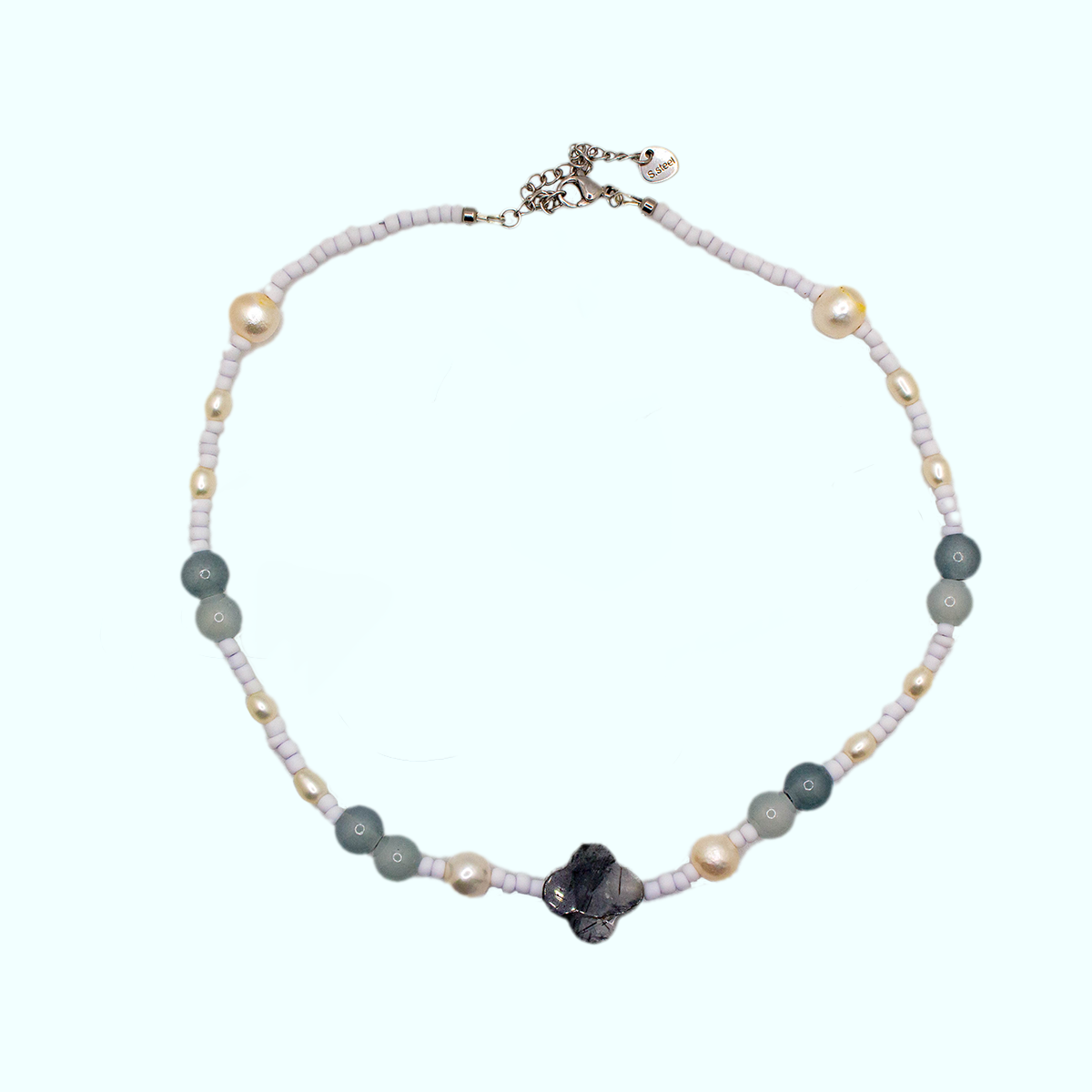 Handmade choker with quartz clover centerpiece, green stone beads, gold pearls, and lavender seed beads